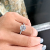 2 Ct Round Moissanite & 0.14 Ctw Diamond Twisted Vine Engagement Ring