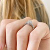 2.5 Ct Emerald Lab Diamond & 0.18 Ctw Trio Cluster Engagement Ring