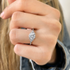 2 Ct Round Moissanite & 0.18 Ctw Diamond Trio Cluster Engagement Ring