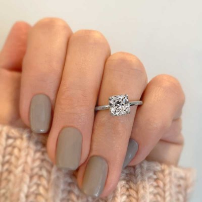 2 Ct Cushion Moissanite & .11 Ctw Diamond Secret Halo Engagement Ring