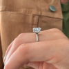 2 Ct Oval Moissanite & .10 Ctw Diamond Hidden Halo Engagement Ring