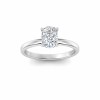 1.5 Ct Elongated Cushion Moissanite & .06 Ctw Diamond Secret Halo Solitaire Ring