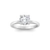 1.25 Ct Round Moissanite & .10 Ctw Diamond Secret Halo Solitaire Ring