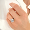 4 Ct Pear Moissanite & .23 Ctw Diamond Hidden Halo Engagement Ring