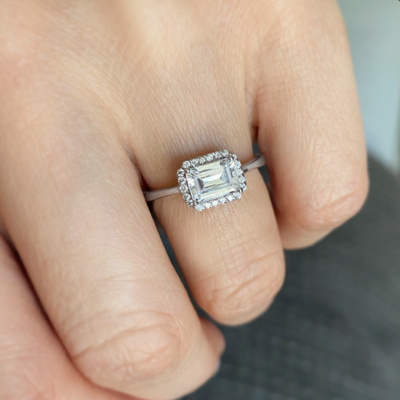 1.15 Ctw Emerald CZ East West Halo Engagement Ring