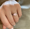 1 Ct Oval Morganite & .14 Ctw Diamond East West Halo Engagement Ring