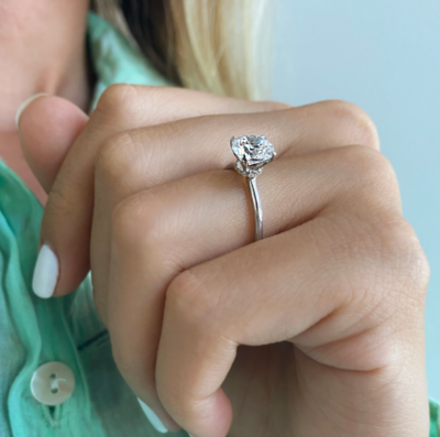 4 Ct Emerald Lab Diamond & .10 Ctw Diamond Secret Halo Solitaire Ring