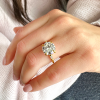 4 Ct Round Moissanite & .10 Ctw Tapered Baguette Diamond Engagement Ring