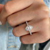 1 Ct Oval Moissanite & .41 Ctw Diamond Pavé Halo Engagement Ring
