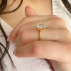 4 Ct Pear Moissanite & .23 Ctw Diamond Hidden Halo Engagement Ring