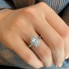 1.25 Ct Oval Moissanite & .15 Ctw Diamond Halo Engagement Ring