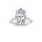 3 Ct Oval Moissanite & .06 Ctw Diamond Secret Halo Solitaire Ring